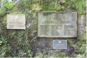 The 3 plaques shown mounted to The Rock near the middle of the forest